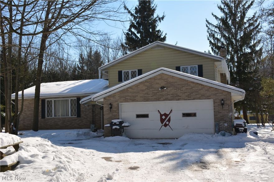 Thought you would never find the perfect setting for your new home? Your search is over in this terrific Bi-Level, set back from the road & located on 3 private acres. This beautiful wooded, secluded property allows you to ”get away from it all” but is still only 5 minutes away from I-71 & shopping! The 2720 sq ft home offers plenty of room for family & guests. The 1st floor features a huge, vaulted Living Rm & Dining Rm, perfect for entertaining the whole crew. The eat-in Kitchen has tons of storage space & all appliances stay. The flex room can be a Bedrm, Home Office, or computer Rm for the kids. A convenient full bath & Laundry Rm completes the main floor. Step down to the cozy Family Rm with a WBFP with stone surround & a walk out to the unbelievable glass enclosed 27x12 Sun Rm with a stunning view! The 2nd level has a huge Master Bedrm with separate dressing area, a private full Bath & a walk out to a raised patio. Two additional large Bedrms complete this level along with a gues