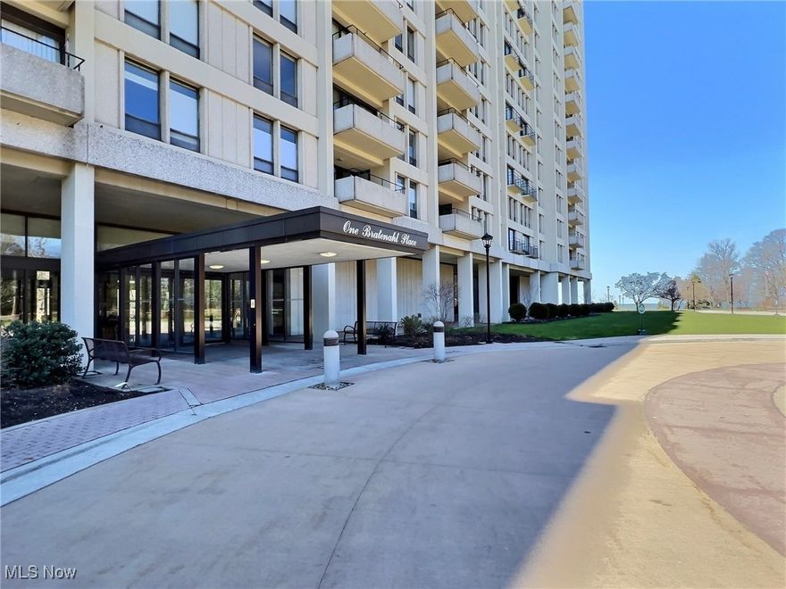 Enjoy resort-style living and incredible lake views from this penthouse suite at Bratenahl Place, one of Cleveland’s most sought-after condo communities. This 2-bedroom, 2-bath unit offers a smart layout with generous living space and a covered balcony overlooking Lake Erie. The primary suite includes a full bath and ample closet space, while the second bedroom works well as a guest room, office, or den. The grounds feel like a private nature preserve, complete with walking paths, lush green space, gardens, and a lakeside fire pit. Amenities include a saltwater pool, clay tennis courts, two laundry rooms, picnic areas, a fully equipped gym, full-service spa, on-site salon, and elegant gathering areas throughout the building. The property also offers 24/7 concierge services, heated underground parking, high-speed fiber-optic internet, and the Bratenahl Place Bistro for resort-style dining. Distinctive architecture, panoramic views of downtown Cleveland and the lake, and pet-friendly policies make it easy to call this home. HOA fees include all utilities and basic cable. Conveniently located near downtown, CWRU, University Hospitals, and the Cleveland Clinic.
