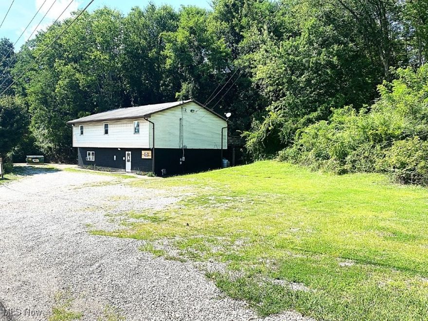 477 Arnoldsburg Rd, Spencer, WV. Needing a home place for business, AirB&B? We have the perfect location just outside Spencer city limits. Former business building 30x50  offers commercial 20x19 kitchen, 11x34 dining area with booth & tables. 15x17 game, etc area. 2 rest rooms. 12x12 storage/utility area. 2nd level offers 1,700 sq ft. Living room 13x26. Eat in kitchen 12x29 (open concept). Master bedroom 12x23, bedrooms 12x12 and 13x9. Bathroom 10x11, laundry, walk up attic. Back deck 12x32. Property fronts Rt 33, large parking lot. City water and sewer. No zoning, so many possibilities! A must see, live and work.