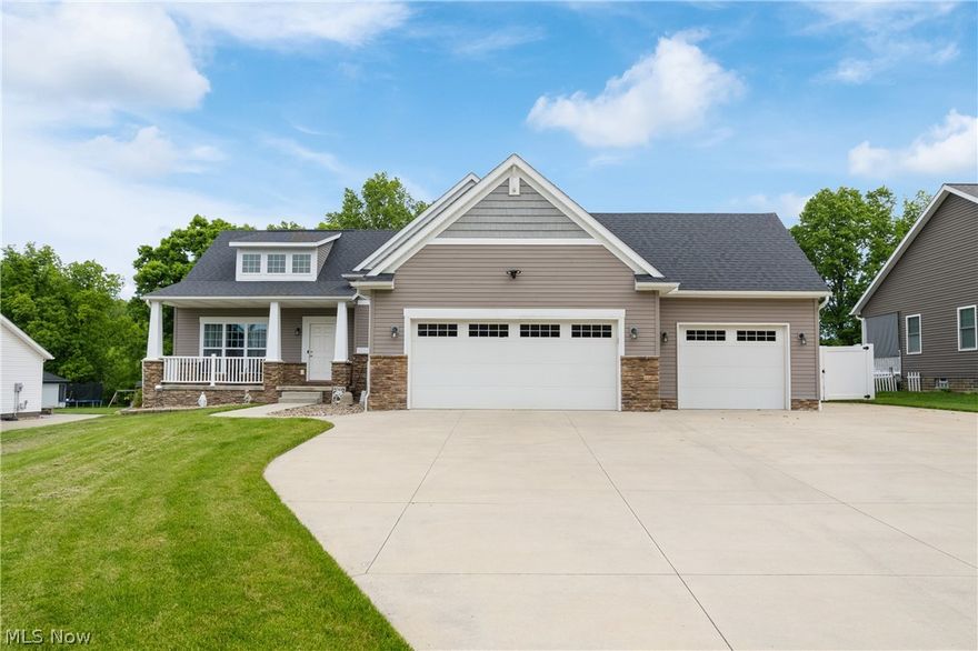 Welcome home to this stunning, turn-key split ranch located at 3097 Brumbaugh Dr NW in the heart of North Canton! Built in 2018, this beautifully maintained property perfectly blends modern design with everyday functionality, offering 3 spacious bedrooms (bonus room in basement with closet) and 2 full bathrooms. The heart of the home features an open-concept layout that flows seamlessly, but the true standout interior feature is the massive, ultra-functional laundry room, which boasts an abundance of cabinet storage and endless counter space to make chores a breeze.
Car enthusiasts and hobbyists alike will fall in love with the expansive three-car attached garage. The third stall is a mechanic's or rider's dream—fully heated, insulated, and equipped with a dedicated motorcycle lift, providing the ultimate year-round workspace for your vehicles, tools, and toys.
Step outside into your own private oasis situated on a generous, manicured 3/4-acre lot. The outdoor living space is an entertainer’s dream, featuring a large patio that is perfect for summer barbecues, alongside a separate covered back porch complete with a relaxing hot tub to unwind in after a long day. The sprawling backyard offers endless possibilities for outdoor activities, includes a charming garden shed for extra storage, and is already perfectly prepped and ready for a pool to be added. Your peace of mind is built right in, as the property features a full vinyl privacy fence paired with a pre-installed electronic dog fence that encircles the entire acreage, keeping your four-legged family members safe and secure.
Don't miss your chance to own this exceptional property that offers the perfect balance of modern luxury, hobbyist perks, and peaceful outdoor living!