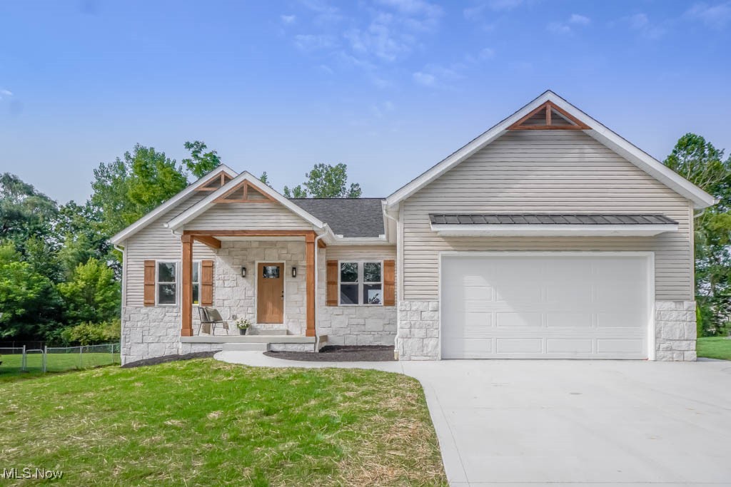 You’re going to love this brand new ranch in Louisville’s Cross Creek neighborhood! It has great curb appeal with a mix of stone and vinyl, plus a welcoming front porch that leads right into an open great room with 9' ceilings. The living area features a stylish accent wall and flows right into the eat-in kitchen with quartz countertops, dovetail soft close cabinets, a center island with bar seating, and a dining area with access to the 12x16 patio, perfect for enjoying the outdoors.
The split bedroom layout gives the primary suite some extra privacy, with a walk in closet and a full bath featuring a tiled step in shower. Two more bedrooms are on the opposite side of the home and share a full bath with a tub and shower combo.
Just off the two car garage, you’ll find a smartly designed mudroom with a built-in boot bench that also serves as the main floor laundry. Head downstairs to find a large rec room already rough plumbed for a half bath, giving you room to grow.
The backyard backs up to a wetland easement with a peaceful creek and views of a neighboring pond and fountain. You'll also appreciate the 50 gallon hot water tank, 200 amp electric panel, 92% efficient furnace, and ProVia double hung windows.
Why wait to build? Come see this move-in ready home today!