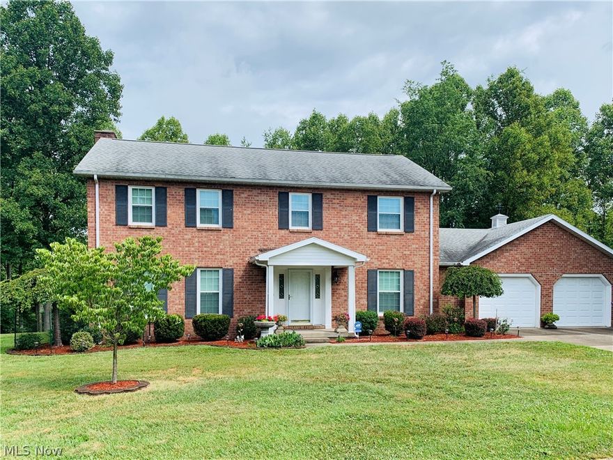 This Stunning brick home is located in beautiful Granada Hills Sub-division! "Well Maintained" best describes this fabulous home. Beautiful hardwood floors, Move in ready with all new carpet on the second level and freshly painted throughout! This home includes an extra lot offering extra privacy! Traditional layout includes 4 bedrooms three full baths, formal living room and dining room, breakfast nook overlooks the beautiful backyard, family room with  brick fireplace is open to the kitchen area & first floor laundry room.   You will appreciate the large lower level recreation room and adjacent unfinished storage area.  This home is beautifully landscaped with a large covered back porch, with serene wooded views, part fenced backyard and a large detached storage building.  Added features include a Generic system & two car garage.  This home is a great value well maintained with fabulous upgrades.