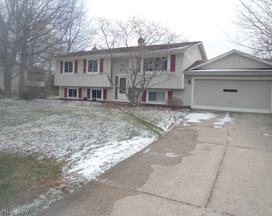 New Year and Welcome to your New Home! Fantastic 4 bedroom, 2 bath home located on a cul-de-sac in a quiet neighborhood but close to the freeway for your work commute. Freshly painted, carpet professionally cleaned. Move in Ready. Furnace and A/C new in 2014. Large great room in lower level has wood burner, wet bar and room for a pool table or play room. All this and sits on 1/2 acre lot with large back yard. Don't wait, this one won't last! Call now for your private showing.