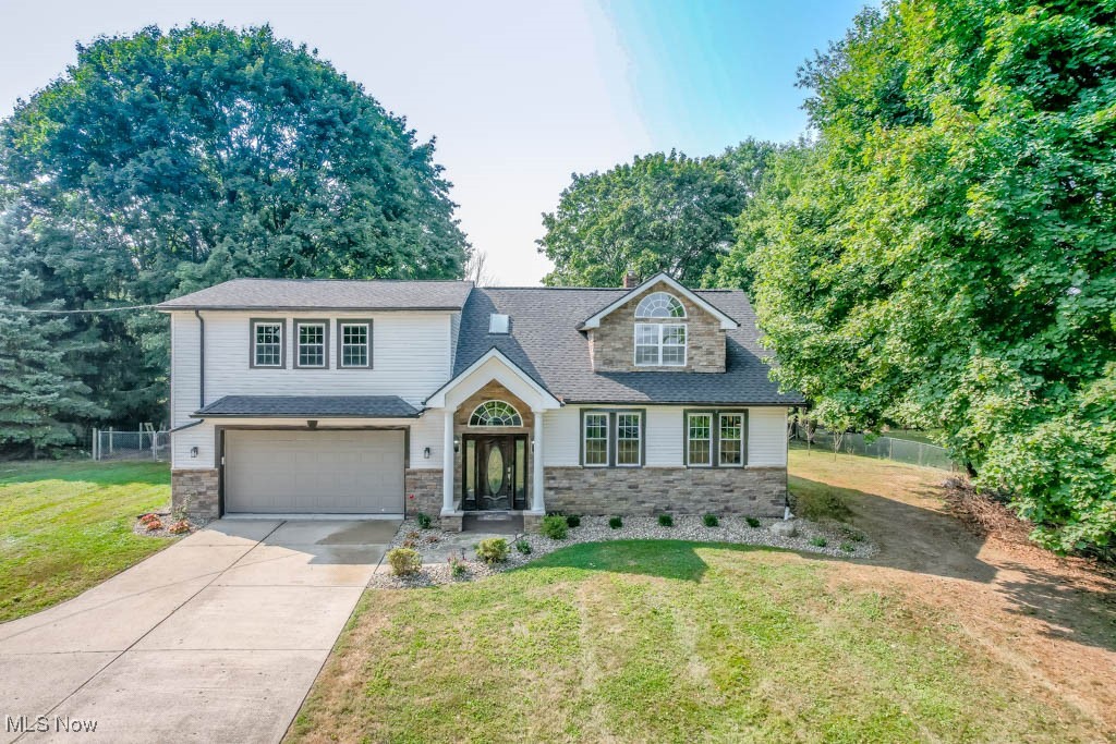 Exceptional 4 bedroom home in Jackson Township, set on nearly an acre and beautifully renovated from top to bottom. A grand two story entry with ceramic tile flooring leads to the 4th bedroom, currently used as a home gym, and a laundry that doubles as a full bath. The open concept main level includes a comfortable living room with a mini bar and bamboo flooring that flows into the eat in kitchen. Here you’ll appreciate the granite countertops, soft close cabinetry, and newer stainless steel appliances.
Upstairs, a reading nook with a Juliet balcony sits between the master suite and the two additional bedrooms, creating a nice sense of privacy. The master offers over 500 square feet with a huge walk in closet and an en suite featuring a tub/shower and a granite topped vanity. The secondary bedrooms are just down the hall, together with a modern full bath.
A full basement and two car attached garage add even more space for storage. Outside, enjoy the deck overlooking the fully fenced backyard and refreshed landscaping that enhances the curb appeal. Notable improvements include a newer roof, furnace, A/C, and blinds throughout. Don’t miss your chance to make this incredible property yours, schedule your showing today!