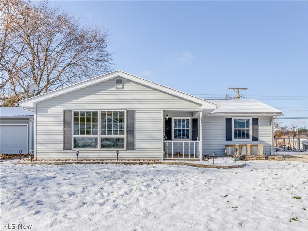 Welcome to this beautiful ranch, tucked away in the Heslop neighborhood, in the city of Cuyahoga Falls! As you come to the property you will notice all new hardscape that was completed in the summer of 2021 for easy maintenance! You will have a fully fenced in backyard that has a gate to access Kennedy Park directly behind it, to enjoy anytime of the year! You are also less than 5 minutes from Water Works Park! As you are admiring the fenced in back yard & patio make your way over to the 2-car detached garage with its own electrical panel. Once you are completed outside, make your way through the front door and admire the living area & dining room that has great big windows to let all the natural light in. As you make your way down the hall you will notice all the beautiful original hardwood floors throughout, the 3 bedrooms, one full bathroom and ample closet spaces! Off of the dining room, you will notice a nice eat in kitchen with ample counter space and cupboards. All appliances a