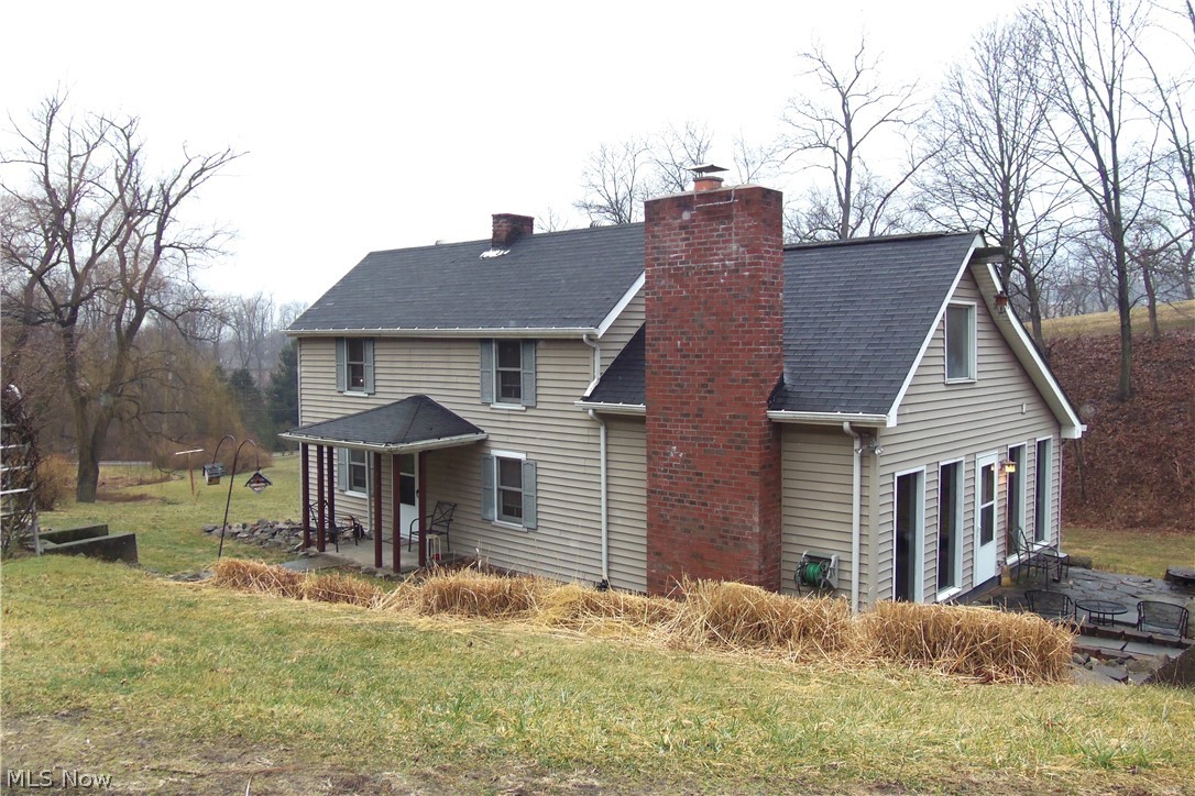 COUNTRY CONNECTION! Take a look at this 2 bedroom home situated on 2.28 acres on Archer Heights Rd. Enter into the great room with gleaming hardwood flooring, soaring ceilings, bar and an impressive stone fireplace. Includes a welcoming and bright eat-in kitchen with vaulted ceiling and spacious, updated bath. Go outdoors and find a spring house that includes a workshop with wood burning stove and an over sized 2 car detached heated garage that could include floor jacks, jack stands, welder, tractor and more!