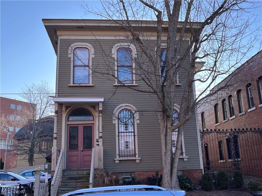 Don't miss out on this beautiful and spacious colonial. Located minutes from downtown, this home has 3 large bedrooms on the second floor, with an additional bedroom on the main floor. Three full baths, newer carpet, tall ceilings, and an updated kitchen fill this unique home. Amazing opportunity for an investor or an owner occupant.