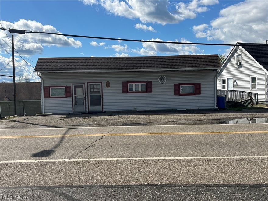 Former Scarlet & Greys Tavern but there is a 1 bedroom, 1 bath on the main level.  Basement area has rec room & bath.  Could be made into efficiency apartment.