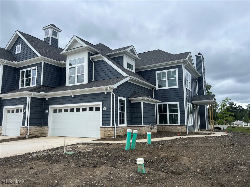 ALMOST FINISHED: This unique end unit is designed for the lock-and-go lifestyle! Featuring 3 bedrooms up, a first floor laundry and flex space, as well as a gourmet kitchen, stunning sunroom, and 2-story gathering room, this home is sure to impress! With an abundance of natural light throughout, the conveniently located home is the final chance to live in a new Pebble Beach at Port Side! The designer/model-like finishes throughout add to the sophisticated look and feel of this spacious home. Schedule time to see this home in person and learn more about the many benefits of living at Port Side!