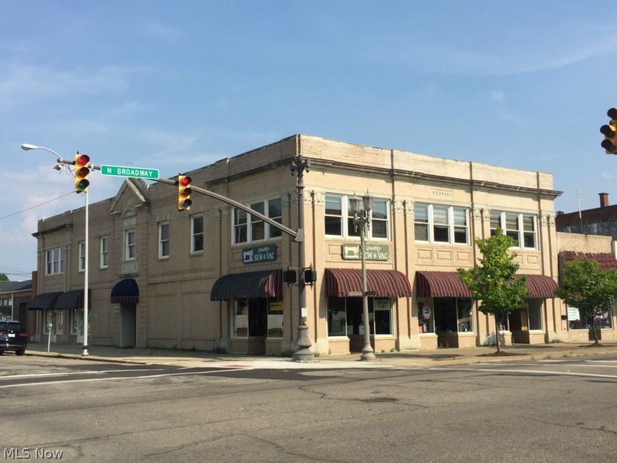 Great opportunity for a prime downtown corner location. Brick 2 story with 15 parking spots. Total of 8,679 sq ft. Income producing and freight elevator. 2,518 sq ft Sew and Vac. 957 sq ft in Antique Shop. 5,203 sq ft for lease at $3,500 a month for upstairs office. Owner occupies Sew n Vac area, will lease back to new buyer. Updated furnaces. Staircase could be opened to join upper and lower level. Basement is approximately 900 sq ft.