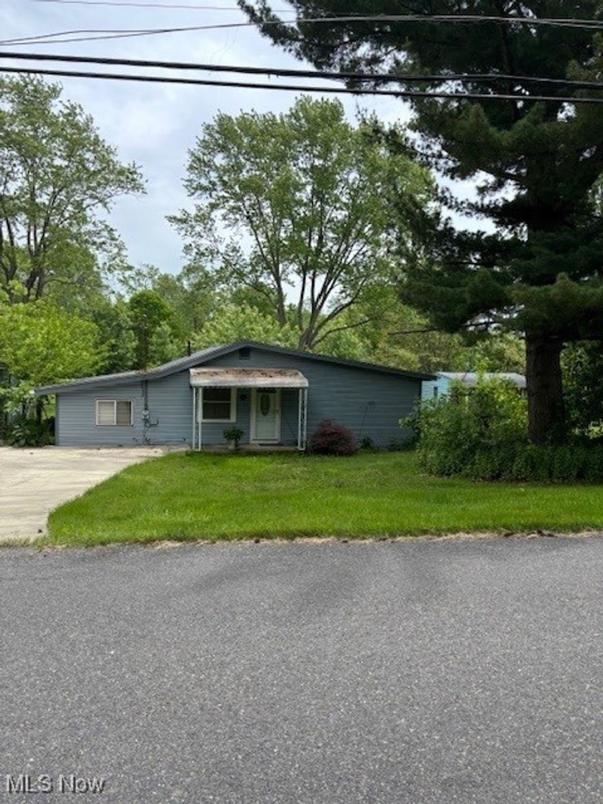 Welcome to 645 Ewart in Springfield, OH! This home features two bedrooms and one bathroom, as well as a spacious living room.

The property features a spacious lot that measures 100 feet by 345 feet, along with an additional lot measuring 62 feet by 367 feet. The entire backyard is fully fenced. With such a large yard, the possibilities for what you can do are endless!

 The oversized two-car garage has recently been drywalled. Additionally, the property includes a second structure on the lot that can be used as a workshop, office, workout space, she-shed, or man cave! This structure measures approximately 19.06 x 13.03

Updates: HVAC 2012, HWT 2011, Garage insulated and drywalled, Roof appx 15 years old, semi circular driveway 2019