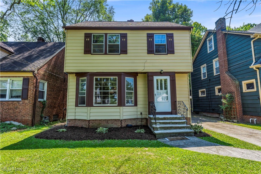 This updated Colonial in Cleveland Heights offers the perfect blend of charm, modern upgrades, and long-term value—ideal for both homebuyers and investors! Set on a professionally landscaped lot, this move-in-ready single-family home features fresh neutral paint throughout and a mix of luxury vinyl plank flooring and beautifully refinished hardwoods! The kitchen has been fully updated with brand new cabinets, granite countertops, modern fixtures, and a new dishwasher—offering style and efficiency for everyday living! The full bathroom upstairs has also been upgraded with a new vanity and fixtures! The main floor features large bay windows that flood the space with natural light and a fireplace that adds character to the living room! Upstairs, you'll find three spacious bedrooms and access to an unfinished attic—perfect for storage or potential expansion! The basement includes a finished rec side and a separate utility area, offering flexibility for entertainment, storage, or workspace! The basement also offers a convenient half bath! Recent mechanical and structural improvements include updated electrical throughout (switches and light fixtures), a new hot water tank (2021), a new garage roof (2024), and professionally cleaned gutters. Exterior features include vinyl siding, a detached 1-car garage, and both upper and lower rear porches for outdoor enjoyment! Located near some of Cleveland Heights’ most popular hotspots, residents can enjoy easy access to Coventry Village with its eclectic shops and dining options, the vibrant Severance Town Center, and the scenic trails of Cain Park! This location offers a wonderful community atmosphere alongside convenient access to nearby amenities! Whether you're a first-time homebuyer looking for a solid home with modern updates or an investor seeking a low-maintenance property with long-term potential, this is a fantastic opportunity for both homeowners and investors! This won’t last long—schedule your showing today!