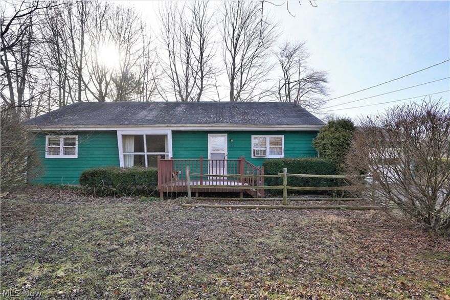 Location, location, location!  Just minutes away from shopping, restaurants, and expressways, this 3 bd/2 ba ranch home is nestled on almost half an acre and sits far off the road - a RARE find in Wadsworth City!  Front porch leads to welcoming foyer and spacious living room with large window.  Bright, eat-in kitchen offers ample cabinetry and multiple windows.  Step down family room with fireplace and laundry hookups converted from garage.  Three bedrooms and two full baths complete main level.  Partial crawl space basement - see disclosure for more info.  Two car, attached garage.  Sprawling front and side yards offer great space for entertaining or playing!  Home needs TLC.  Sold AS-IS!  Schedule your showing TODAY! MOTIVATED SELLER!!!