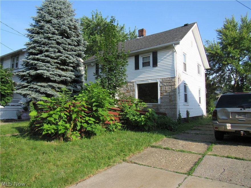2 full baths and hardwood floors! Newer roof, windows and siding.