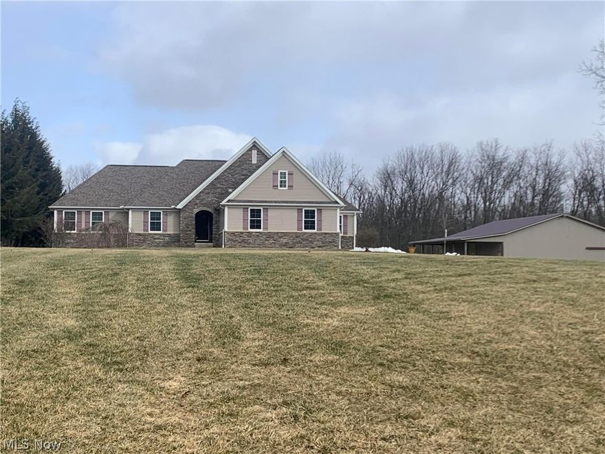 This beautiful property offers a home built in 2014 by Schumacher Homes w/ so many upgrades! The all-seasons room is full of windows to enjoy the sights of wildlife & view a branch of the Kokosing River. This 2,185 Sq Ft open floor plan home w/ 3 beds, 3 full baths & den/office has so much to offer. Hickory cabinets, quartz counter-tops, vaulted ceiling, large pantry & main level laundry, no detail was overlooked. The extra wide hall/doorways are a fantastic feature. Finish the basement & have double the living space w/ an exterior walk-up! The large barn is well insulated w/ concrete floors & has the perfect space for entertaining guests! Plenty of workspace/Storage. Over 11 ac. of country living with Delco water-2 miles to 71 exit & just 30 min. from Polaris! *More pics coming*