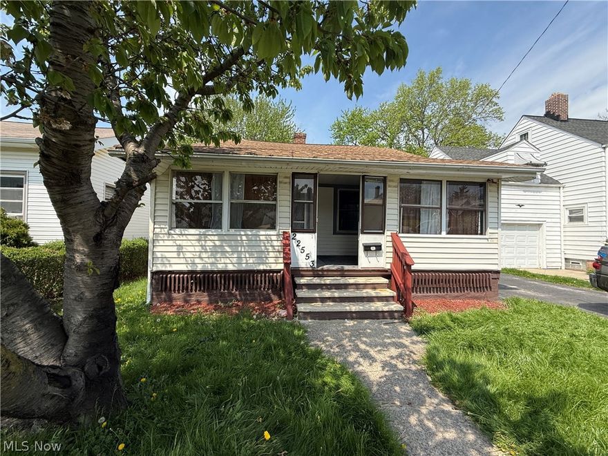 Nice Euclid fixer upper that needs updating throughout.  Large front porch.  Potentially eat in kitchen.  Upstairs flooring is soft in some places and may need some reinforcement.  Large 2 car garage with extra storage space in the rear.  As is sale.  Buyer to assume City violations.