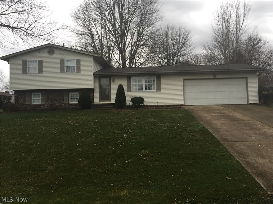 1 owner home in desirable Perry Twp neighborhood.  3 bedrooms,2  baths.  Possible to make 12x8 workshop into 4th bedroom.  Home has been well cared for with lots of updated including roof, siding, windows and carpet in 2013.  Kitchen has Scrock cabinets and updated appliances.  This is a must see home!