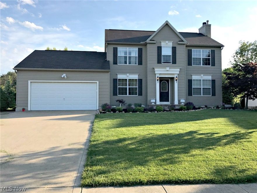 Charming, move-in ready colonial located in sought after Turnberry of Medina! The attention and care lavished on this home are apparent the minute you see the newly, beautiful landscaped yard. Once in, you are greeted with an open, bright floorplan. You will appreciate the fresh décor to satisfy the tastes of today's discerning homeowner with its neutral palette and charming finishes.  The eat-in kitchen is spacious with loads of counter and cabinet space, along with a large breakfast bar. Newer stainless steel appliances are included!  Located off the kitchen, you will find a bright and airy morning room showcasing a vaulted ceiling and loads of windows, allowing for natural light to stream through. Sliding doors lead to the generous backyard deck.The adjacent Family room includes a cozy fireplace. Formal dining room boasts trey ceiling. First floor laundry room includes newer washer and dryer. Located on the second level are 4 spacious bedrooms, featuring the master retreat w/ full e