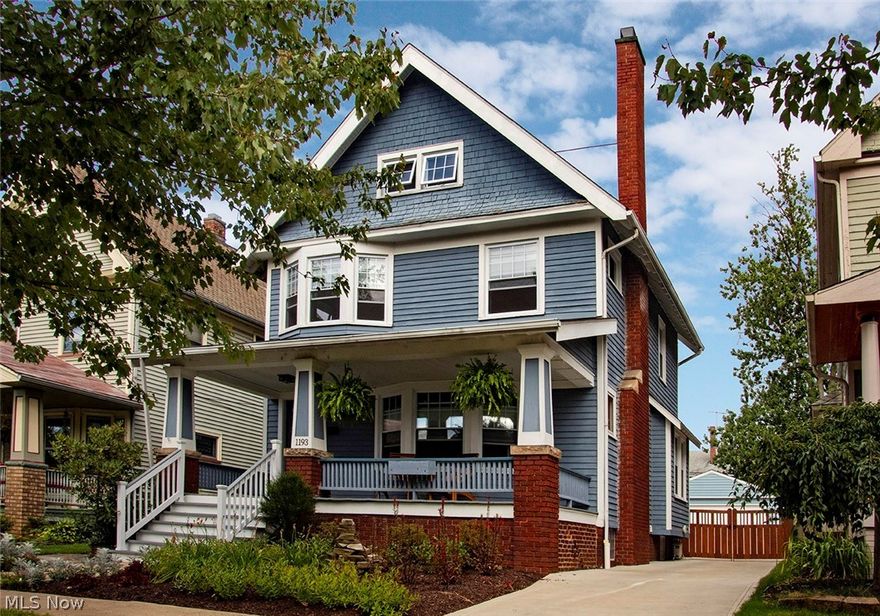 Gracious elegance meets contemporary comfort in this wonderfully situated classic Lakewood colonial. This home offers an open floor plan combined with rich oak woodwork and beautifully detailed craftsmanship. Lovingly landscaped, with a fully fenced private back yard, and a large deck. Newer 2 car garage. Recently renovated kitchen with granite counter tops and stainless steel appliances open to the formal dining room. 3 spacious bedrooms on the second floor and renovated full bath. Inviting third floor master, or hide away, with wet bar and a full bath. Upgraded electric, new efficient tank-less hot water tank. Andersen windows. Basement floor and interior drain tiles replaced. Near Lakewood Park and many amenities.