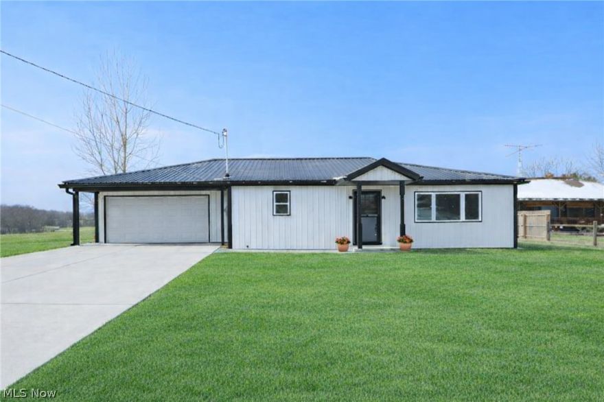 Completely renovated and move-in ready, this property offers peace of mind with all the big-ticket items already new. The bright interior features updated flooring, fresh finishes, and an inviting open living area filled with natural light. The stylish kitchen showcases new cabinetry, granite countertops, and stainless appliances, creating a clean, modern space perfect for everyday living or entertaining. The bathroom has been thoughtfully updated with contemporary fixtures and a crisp design. Downstairs, the spacious lower level is ready to finish, offering endless possibilities for additional living space, a recreation room, home office, or extra bedrooms, adding both function and future value. Outside, enjoy the generous lot with open views and a large garage/outbuilding ideal for storage, hobbies, or workshop space. This property combines comfort, quality updates, and room to grow in a peaceful setting.