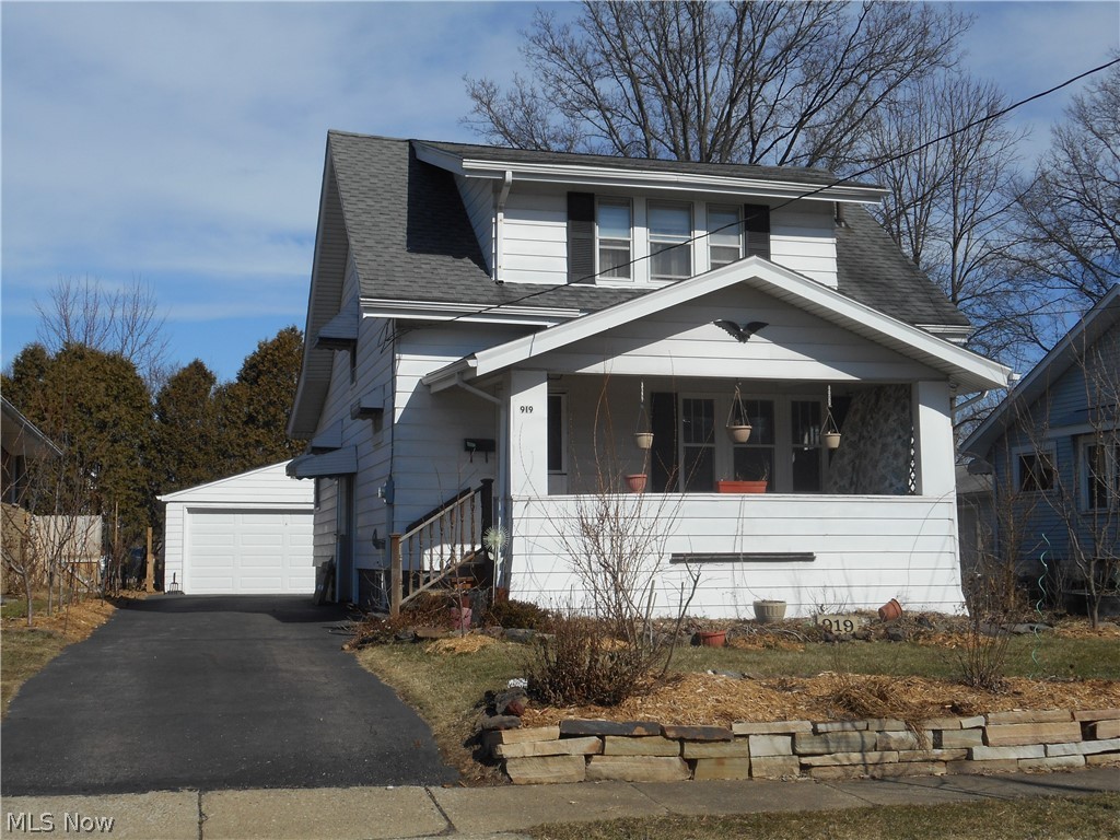 Very nice charming, 3 bedroom colonial offers 1st floor bedroom, hardwood floors throughout most of the home, huge eat in kitchen featuring plenty of cabinet and counter space (appliances convey), & fireplaced living room. Enjoy the open porch this spring and summer! Oversized 2 car garage with door opener. Spacious bedrooms and nice closet space. There are several plants and trees on the property (raspberries, strawberries, plum trees, fig trees, black-eyed Susan...just to name a few. A complete list can be provided for the buyer). Updates include: A/C replaced in 2014; Hot Water Tank replaced in 2013. Home Warranty for added peace of mind.