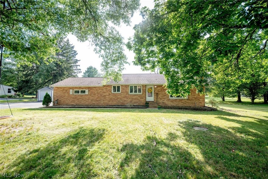 Serenity awaits!! A solid brick ranch, sitting upon one and a half acres in the desirable Chesterland! On a quiet street with plenty of space to enjoy the outdoors. Three bedrooms, one and half baths, with a full basement. Many updates and improvements such as: a concrete patio, outbuildings, luxury vinyl throughout, replaced all the doors, remodeled the main bath, replaced light fixtures, replaced the ceiling fan, painting, and more! Don't miss your opportunity to experience the perfect blend of serenity and charm. Call today for your showing!!