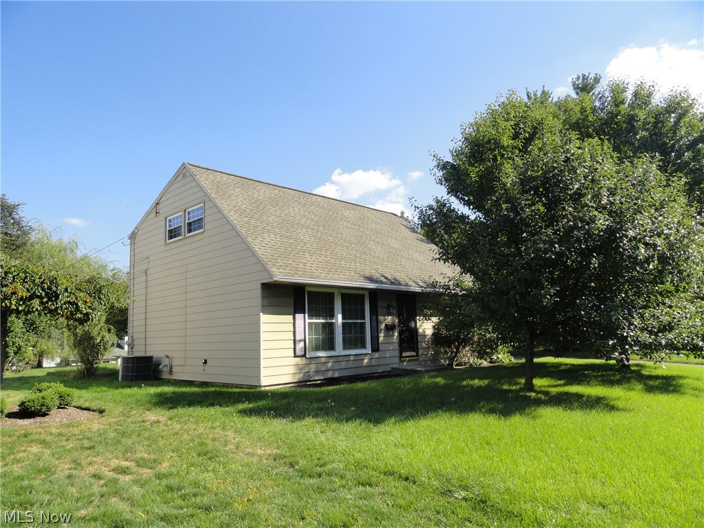 Clean home with many updates and a beautiful yard. Fresh paint, new carpet, newer roof, newer windows, newer furnace! Enjoy both of the updated bathrooms, full bathroom upstairs and a half bath on the main floor. First floor has an open floor plan great for entertaining and Holiday's. First floor bedroom. Two well sized bedrooms on the 2nd floor with great closet space. Full basement with tons of potential. Enjoy the concrete patio and large backyard. Two car garage.