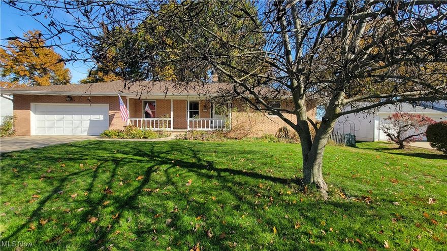 Welcome to this spacious residence nestled in the highly desirable River Park Estates community of Munroe Falls. Featuring 2 bedrooms and 2.5 baths, this home surprises at every turn—the entire lower level mirrors the footprint of the main floor, effectively doubling the living space and offering clear potential to create 2, possibly 3 additional bedrooms, a guest suite, or multi-generational living. A welcoming foyer with slate flooring opens into a massive living area. A wood-burning fireplace and custom built-in cabinetry create a warm, inviting atmosphere. The kitchen features custom cabinetry, generous storage, and an island, flowing seamlessly into a charming sunroom with views of the backyard. Both main-level bedrooms are generously sized, featuring hardwood floors and large closets. The finished lower level features a full wall of windows overlooking the backyard, the space feels bright and connected to nature—rare for a lower level. This level includes a 2nd kitchen, a large recreation area, an office/bedroom, a media/theater room, and an additional fireplace, making it ideal for a teen retreat, extended family living, or rental opportunity. The unfinished area is perfect for a home gym, art or craft studio, or workshop. Step outside to enjoy a private backyard retreat complete with a deck, patio, mature privacy landscaping, and storage shed. Garden lovers will appreciate the established perennial beds, old-growth blueberry bushes producing multiple bushels of fruit, and stunning 30+ year-old rhododendrons that bloom beautifully each year. Additional highlights include an attached two-car garage with hot and cold water, walking-distance access to the neighborhood bike path and multiple parks and hiking opportunities all within 10 minutes. This home offers space, comfort, natural beauty, and remarkable future potential. With a motivated seller and endless possibilities, this is a rare opportunity to own a home that truly grows with you.