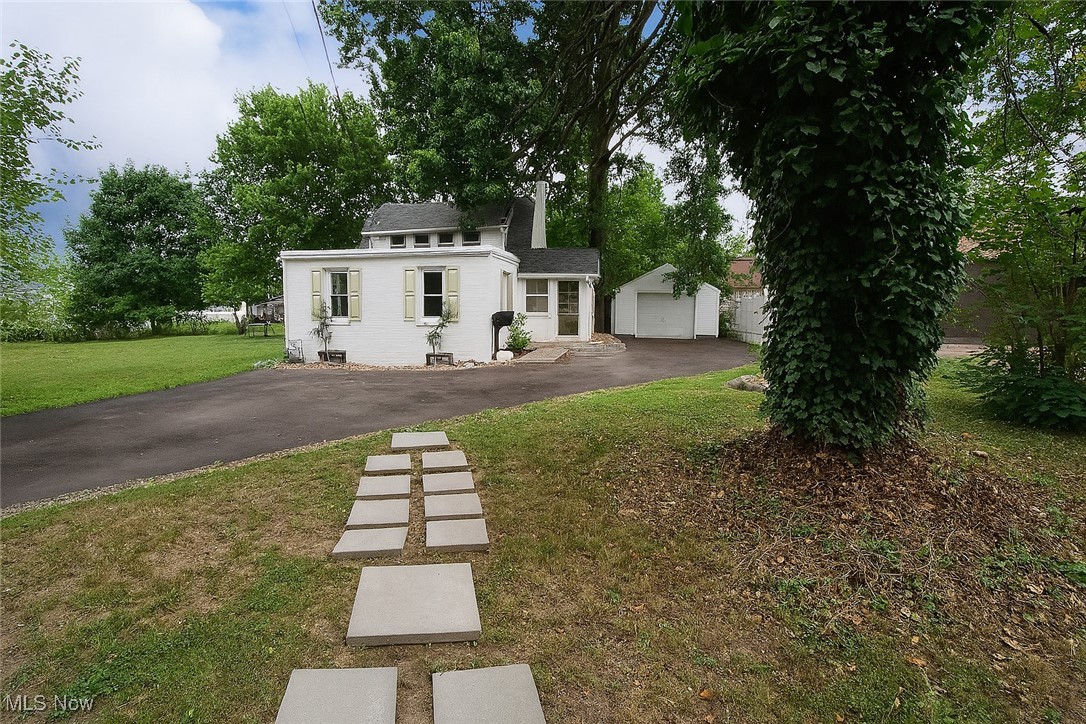Welcome to this beautifully updated 3-bedroom, 1-bath Cape Cod that blends charm with modern flair. Nestled back from the street, the home enjoys a peaceful, park-like front yard—ideal for morning coffee, or evenings by the fire pit. Inside you'll be greeted by the Bright and inviting sunroom, perfect for relaxing, then you will find fresh paint and vinyl flooring that flows throughout a light-filled layout. The kitchen and bath have been thoughtfully renovated with modern finishes. Enjoy hot summer days new central air unit recently installed. Other upgrades include a new roof, new driveway, newer hot water tank. This move-in-ready gem is waiting for the perfect owner to settle right in! Don’t miss the chance to own this delightful home! Call for a showing today!