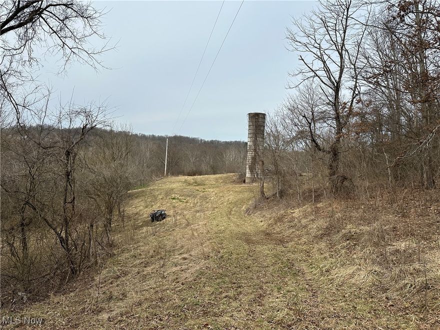 Situated just outside the Marietta city limits, this exceptional 70.06-acre property in Washington County, Ohio, offers the perfect combination of prime whitetail hunting and income potential and provides the perfect escape from the hustle and bustle of town. With a gently rolling landscape featuring a mix of mature timber, open fields, and thick bedding cover, this land is a hunter’s paradise, home to trophy deer, turkey, waterfowl, and small game. Duck Creek flows around the western edge of the property, providing a natural water source and enhancing the diverse wildlife habitat. Established trails and roads ensure easy access throughout the land, making it ideal for hunting, ATV riding, and exploring the great outdoors. For those seeking investment opportunities, this property generates $4,600 annually from a billboard lease, which is transferable to the new owner. Clear property boundaries ensure peace of mind, and electricity extends to the top of the hill for future development. This secluded yet convenient location offers the best of both worlds—privacy, and proximity to amenities in Marietta. Whether you’re looking for a premier hunting retreat, a recreational haven, or an income-generating property, this Washington County gem delivers on every front.