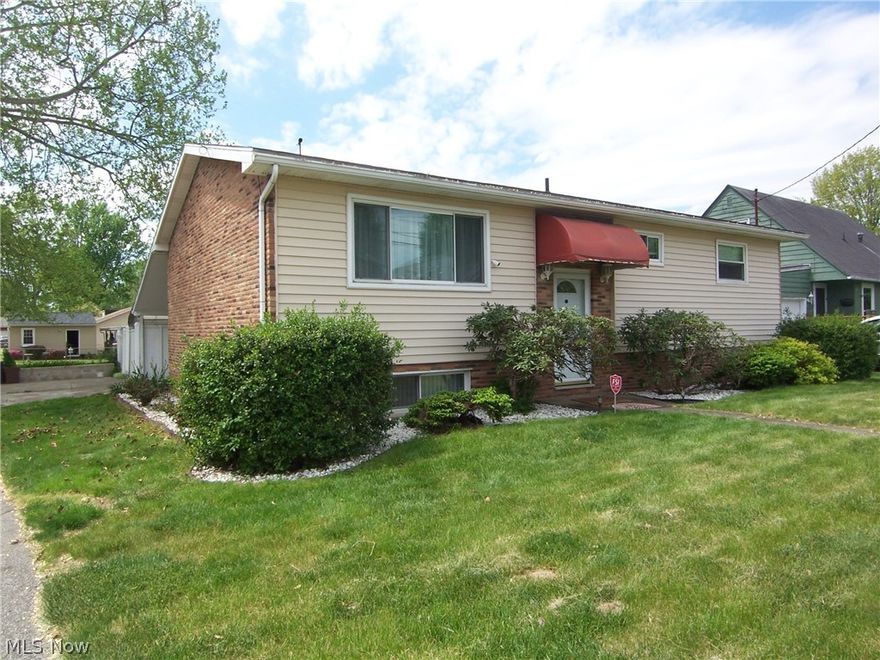 Three bedrooms, 2.5 baths with covered back porch, fenced-in yard, 2 large covered carports.  Snack bar in kitchen and dining area.  Newer flooring in the bathrooms and kitchen.  Interior rooms were recently painted.  Large unfinished area in the basement with extra storage shelves and a doggie door in the walk-out basement to a fenced-in yard and carports.  Chair lift on back stairs.