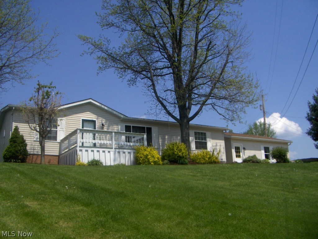 Country living but close to town! This well maintained 3 bedroom, 2 full bath ranch manufactured home is ready to move right in. The home also offers a large 2 car attached garage and a nice deck out front. Call today to schedule your own private tour.
