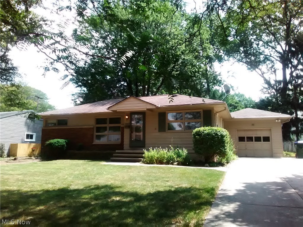 Nicely landscaped 3 BR ranch in Cuyahoga Falls with 1 car attached garage, and fully fenced in back yard with brick patio. Gigantic basement with utility, workshop, storage, and recreation areas. Comes with washer, utility sink, and laundry chute downstairs, as well as fridge, countertop range, double wall oven, and dishwasher in kitchen. Fridge currently in garage, and can be moved inside if tenant does not have own fridge. No pets or indoor smoking. All applicants 18+ years old must apply online, where we screen for credit, criminal, and eviction history. $35/adult non-refundable app fee.
