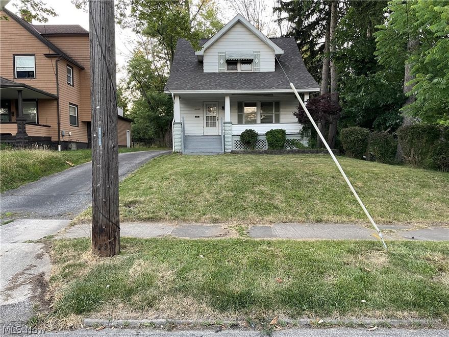 Welcome to this charming 2 bedroom 1 bath home! As you step inside the natural light floods the home you immediately notice the beautiful hardwood flooring in the dining room and built -in features which add for ample storage solutions, while seamlessly blending the functionality and style. The eat-in kitchen allows for gatherings everyday meals and entertaining. Both bedrooms are generously sized, offering plenty of room for relaxation and rest. Each comes with walk-in closets. The basement is full and partially finished could be additional space to add a bedroom and another bathroom. Enjoy the outdoors by way of the upper deck, overlooking the fenced yard. Perfect for gardening, pets, gatherings or simply enjoying the fresh air. Additionally, the back of the house and 2.5 car garage features extra storage spaces ensuring you have plenty of space for outdoor equipment and tools. This home combines charm, comfort.