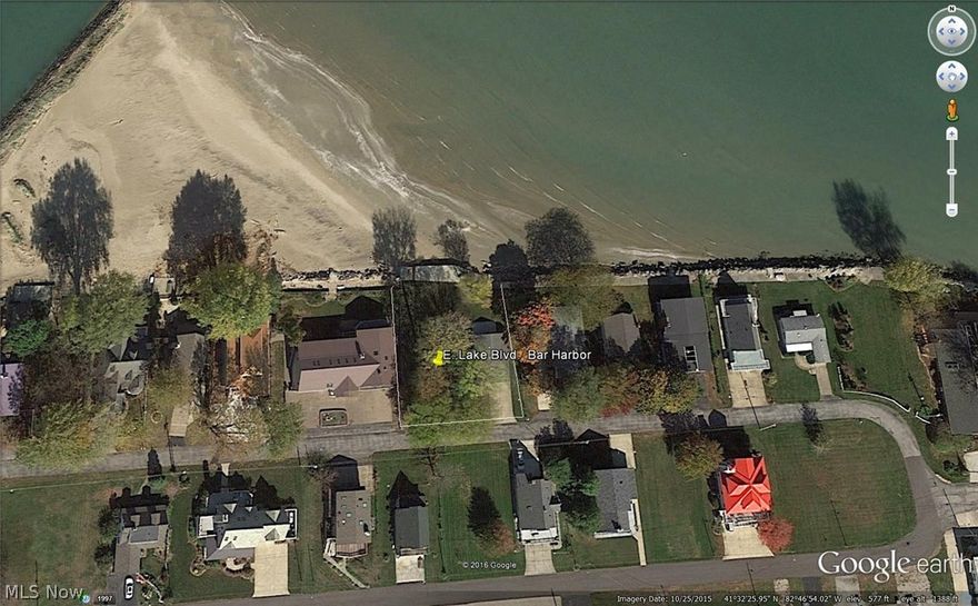 Direct Lake Erie Waterfront In Historic Marblehead's Bar Harbor.  This is a rare opportunity to own a little piece of heaven on the North Coast. The Gated, private community includes a club house, protected dockage and private beach. The real treasure is in the unobstructed view of the Lake. A large cement break wall is easily accessible by a few steps to enjoy the view from a different vantage point. It also allows easy access to the large, sandy beach with shallow entry. Spend your days swimming, looking for sea glass or just relaxing; and spend your evenings watching spectacular sunsets and soaking up the peaceful sounds of the surf. Dockage also available for rent or purchase.