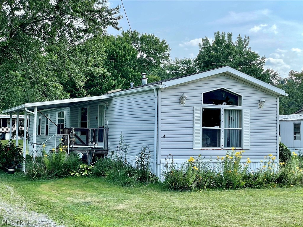 Why rent when you can purchase this nicely kept Mobile Home. This home features two large bedrooms and two full baths, huge living room and a kitchen with more than adequate storage and counter space. All rooms have vaulted ceilings and several skylights. Outside you will find a lovely covered patio and 21x10 storage shed. The yard is very big with lots of room between you and your neighbors. All appliances stay. HWT, A/C, Refrigerator, wood floor in kitchen and carpet are all less than 8 years old. Conveniently located near highways and major roads. Come take a look at this really nice mobile home before its gone.