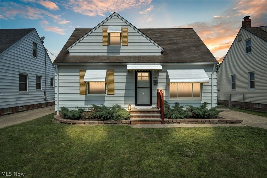 With many great updates throughout, this cute Garfield Heights home is ready for you! Original hardwood floors flow throughout the living room and bedrooms. The kitchen has been tastefully updated with a sleek, modern look and open shelving. Plenty of counter space, stainless steel appliances and a beautiful subway tile backsplash are accented with shiplap walls. 2 bedrooms with original hardwood floors are on the first floor - one of the bedrooms is currently used as a dining room. A recently updated full bathroom completes the first floor. Upstairs you will find a large bedroom, perfect for an owner's suite. The basement has been fitted with a huge, amazing full bathroom. Entertaining is a breeze with the large deck, patio and a fully fenced in yard. A one year home warranty will be provided for your peace of mind.