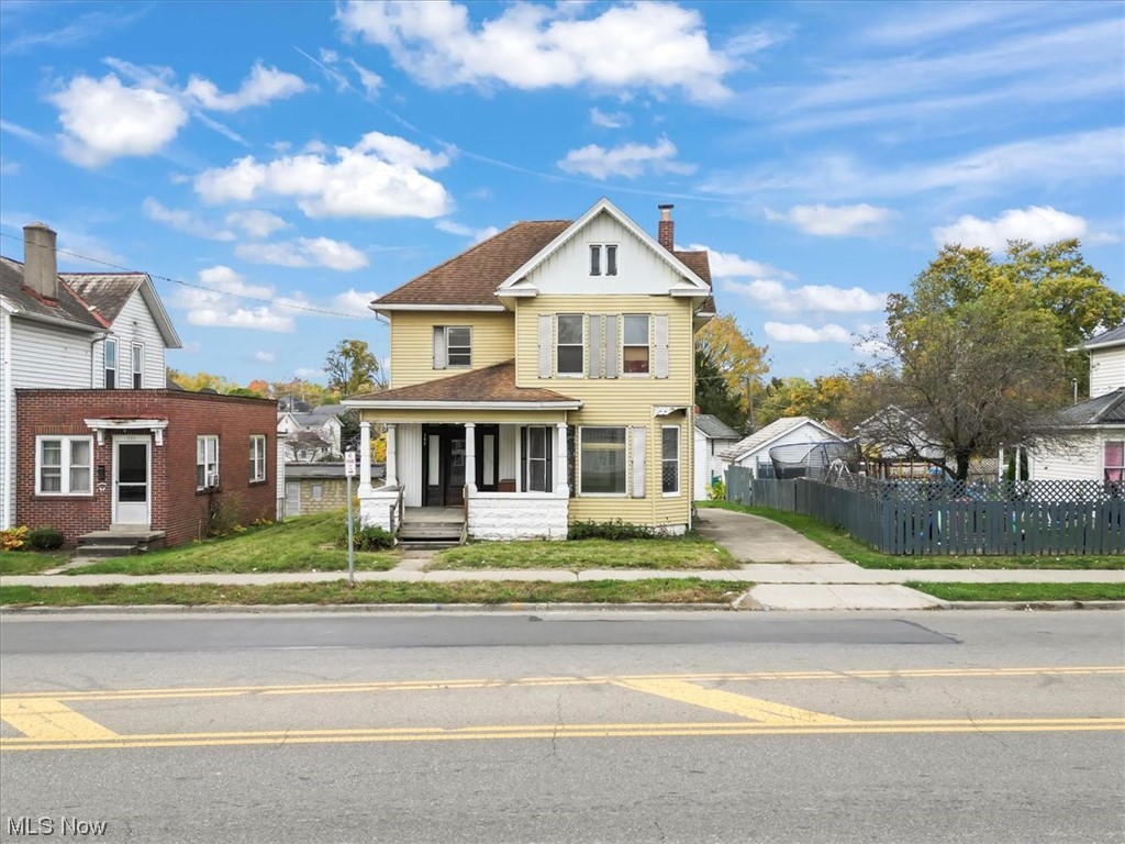 This traditional 2.5 story home has original woodwork and wood floors! Walk into your open foyer that features the staircase. Walk into the living room then into the formal dining room that leads into the kitchen. Off of the kitchen there is a half bath, large pantry, enclosed back porch with laundry. You can also head to the second story from the kitchen. Large hallway leading to 3 bedroom and 1 full bath. Walk up attic and full basement, both unfinished. This is ZONED LIMITED OFFICE DISTRICT. Prior to seller, this was a State Farm Agency. Close to downtown Newark, several places of worship, close to St Rt 16.