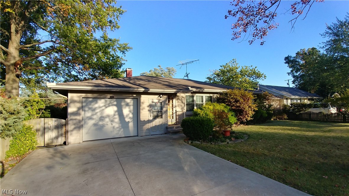 Great curb appeal on this three bedroom ranch with one and a half bathrooms. Spacious family room leads to rear deck and a beautifully landscaped backyard with privacy fencing and two storage sheds.