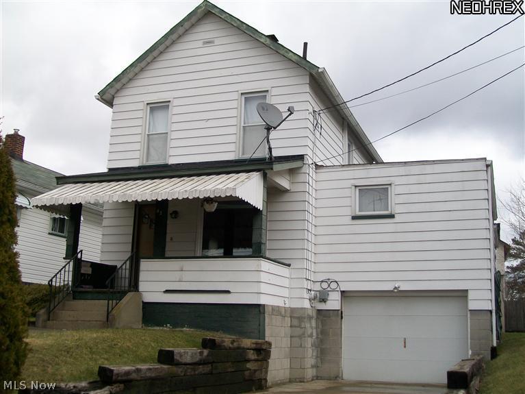 Nice two story home located on very private dead end street featuring spacious living room, dining room, family room with full first floor bath (previous owner used as first floor master), two bedroom upstairs with full bath, enclosed sunroom(first floor laundry currently), fenced backyard, front and side porches, attached garage, owner will consider Land Contract.