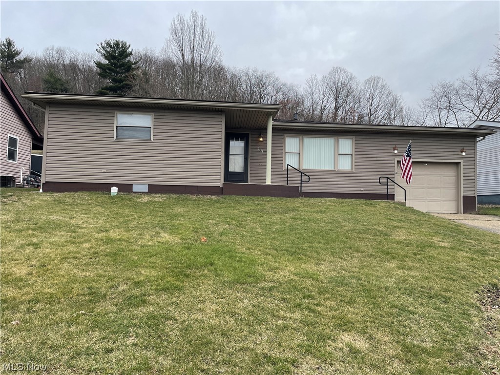 So much to offer with this neat and clean 3 bedroom ranch at the edge of town. New carpet in the living room, bedrooms, and hallway in 2023 nicely updates this home. Two great features of this home are the 24 x 12 back deck and the large fenced in back yard allowing for entertaing family and friends with privacy. The fenced in back yard would also be perfect for pets. There is also a 16'.10" x 12 attached outbuilding for more convenient storage. The kitchen includes a neutral counter top, and a stainless steel sink that includes reverse osmisis. The appliances are included. This kitchen also has an abundance of cabinet space. The huge picture window in the living room allows for abundant natural light. There is a large hall closet allowing for even more additional storage. The convenient attached garage is another great feature of this home. Taxes reflect a homestead credit of $898.28.