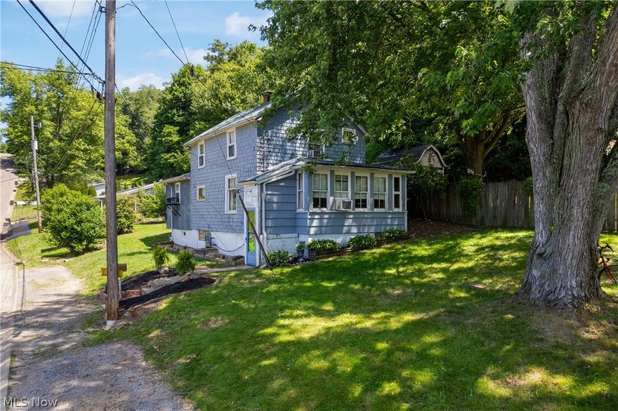 Nestled in the heart of charming Millersburg, Ohio, this enchanting colonial hillside home, built in 1940, showcases many original details. The main floor invites you in with a spacious mudroom that can double as an office, leading into a cozy dining room, kitchen, and a bright living room. Enjoy the convenience of main floor laundry and a full bath featuring a classic clawfoot tub. Upstairs, discover three charming bedrooms and another full bath. The backyard is a private retreat,
boasting a firepit, raised garden beds, a chicken coop, and two storage sheds. This sale will feature 2 parcels of land.  While the seller is unsure about the furnace's condition, this property is being sold
"As-Is," offering a unique opportunity to own a piece of history and infuse it with your personal touch. Embrace the charm and potential of this Millersburg gem!