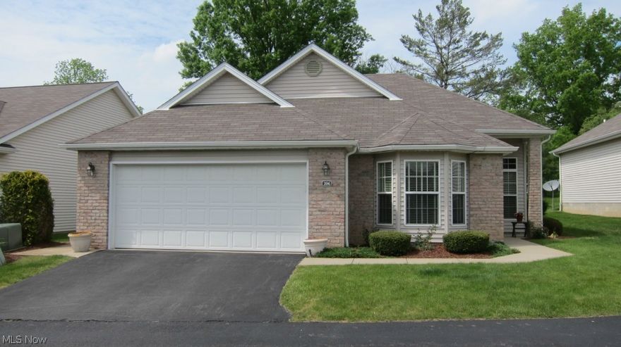 The location doesn't get much better than this.  This exceptionally clean three bedroom villa built in 2001 features a vaulted ceiling in foyer and great room with fireplace and plenty of natural lighting.  Open kitchen plan with plenty of cabinets. Three spacious bedrooms with two full bathrooms.  Two car attached garage.   So very close to shopping, schools and easy access to interstate.  This villa is priced to sell!  Home owner's association fees include garbage and snow removal, grass cutting and outside maintenance.  Call today before it's gone!