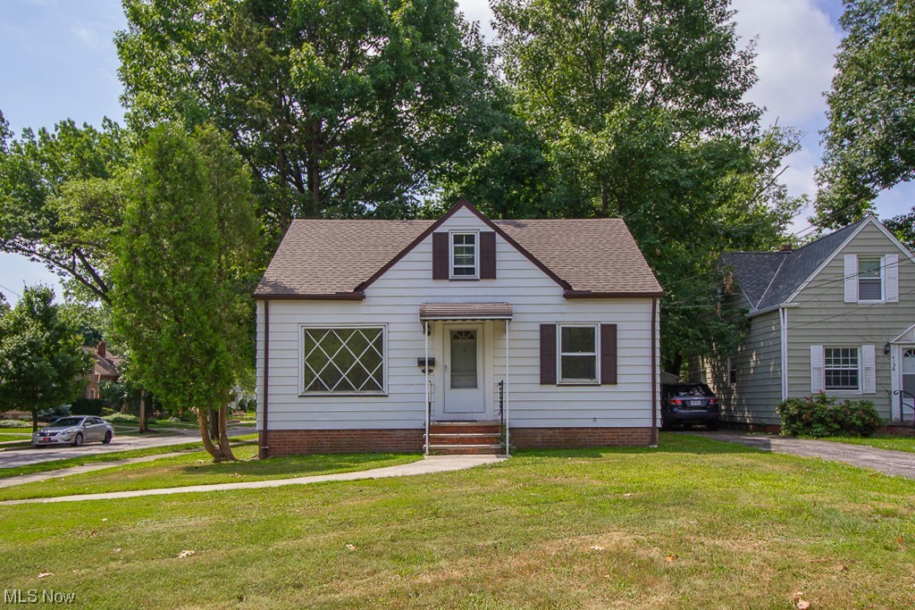 Tenant occupied investment property. Cape cod home with 3 bedrooms, 1.5 bathrooms, basement and detached 2 car garage.