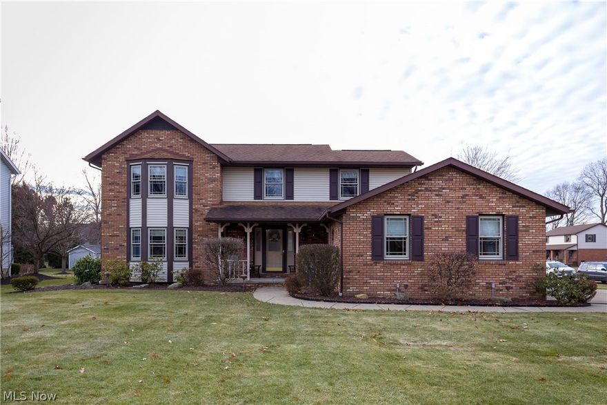 An exceptional 4 BR home in a great neighborhood, close to schools, park and YMCA. From the moment you walk into the exceptional foyer that features new wood flooring and two large closets, it is certain to take your breath away. The first floor features a large kitchen with new granite counters, appliances, light fixtures, ceramic tile flooring, and oak cabinets. The kitchen opens to a large warm inviting family room with a gas fireplace. The other side of the kitchen opens to a dining room/den that is open to the formal living room with a bay window that allows for natural light to warm the room. The first floor also features a laundry room with new appliances and a large half bath. The second floor all freshly painted and new carpeting features a master bedroom with a bay window, a walk in closet with built in storage, a master bath with enclosed ceramic tile bath, a separate vanity area, double sinks with granite counter tops, shower, ceramic tile flooring, and plenty of storage. C