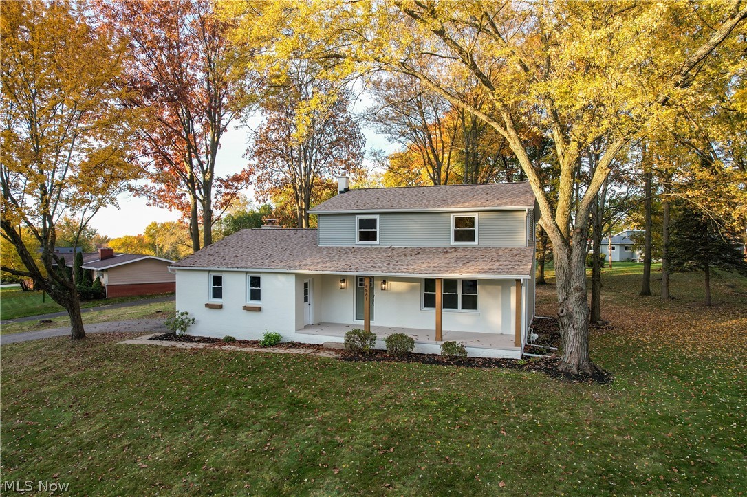Wow! Beautiful and meticulously updated North Canton home.
Everything is shiny and new. Walking through the front door you suddenly feel like you've come home.
From the beautiful kitchen with new appliances, lighting and quartz counters to the new first floor laundry with half bath and custom cubbies you will think this home we just built. First floor family room with wood burning fireplace, luxury plank flooring and accent wall with access to the back patio and large private rear yard. The new owners retreat is finished beautifully. Tons of closet space and a gorgeous ensuite bath. New vanities, quartz counters, custom tiled shower and floor plus a large walk-in closet. Family bath is all new with quartz counters, new vanities and tile floors. Brand new roof and all new windows, new siding, new AC, new hot water tank and all electric and plumbing has been updated. Home has been freshly painted inside and has all new beautiful lighting.