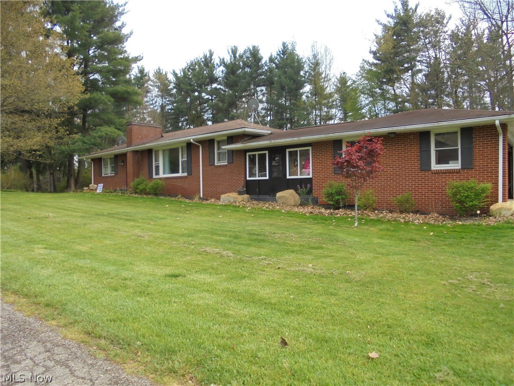 Country setting near Bethany College. 3 bedroom brick ranch home one .88 acre. Fence may not stay. Generator hook up. Motivated to sell. Currently rented. 2008 hot water tank. Pantry in kitchen, sliding door to deck from family room. Chimney capped. Hardwood thru out home per seller. Make this yours today !!
