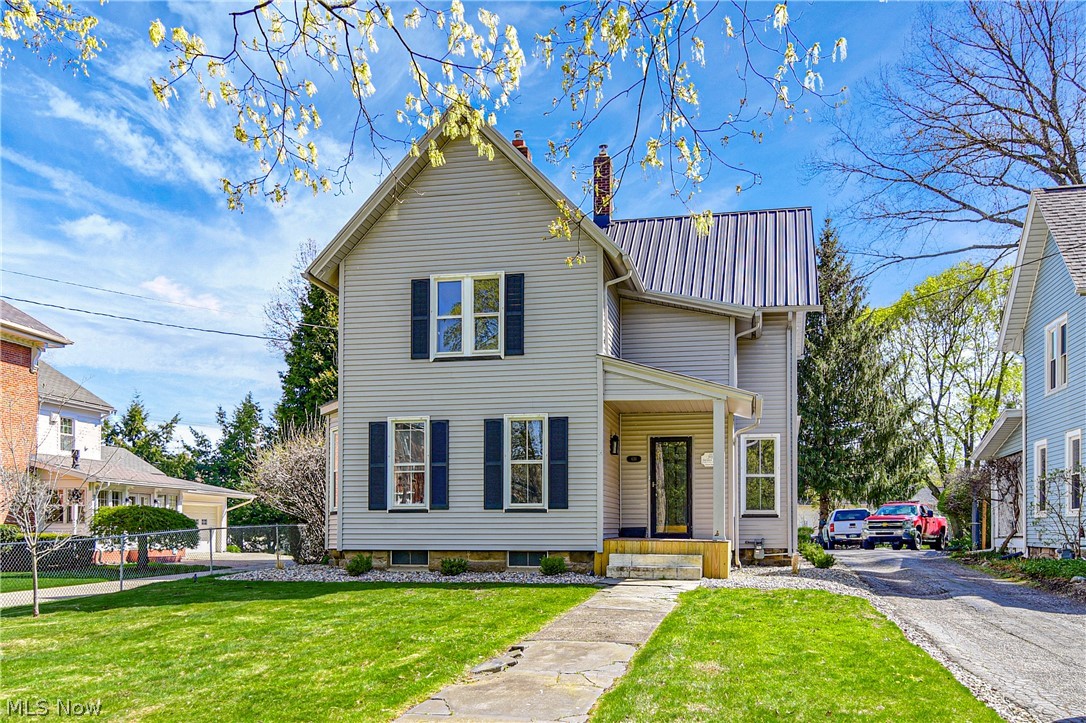 Get ready to fall in love with this stunning Salem home that offers the modern conveniences you seek while keeping its historical charm. The living room offers a cozy gas fireplace and gorgeous restored original hardwood floors that span throughout the first floor. Vinyl flooring greets you in the kitchen that offers a subway tile backsplash, updated cabinets and countertops, and recessed lighting. Off the kitchen is the gorgeous 4 seasons room with large windows, tile flooring, and a sliding glass door that takes you out to the spacious deck overlooking the quaint and quiet backyard with a detached two car garage. The first floor is complete with a master bedroom with en suite bath, a half bath, and a laundry room. The upstairs offers 2 bedrooms and a full bath. Meticulously maintained and a fresh coat of paint on each wall - this home just needs you to move right in! Did we mention it’s also in close proximity to shopping and restaurants? There’s absolutely nothing to lose, the perfe