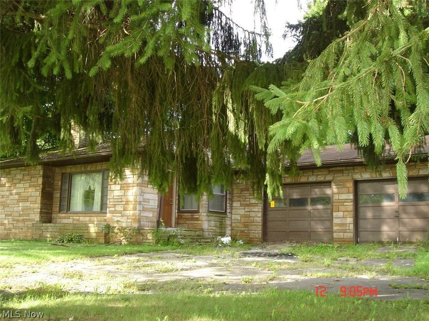 Three bedroom, one bath ranch with 2 car attached garage on the outskirts of town.  Being sold "as is".
