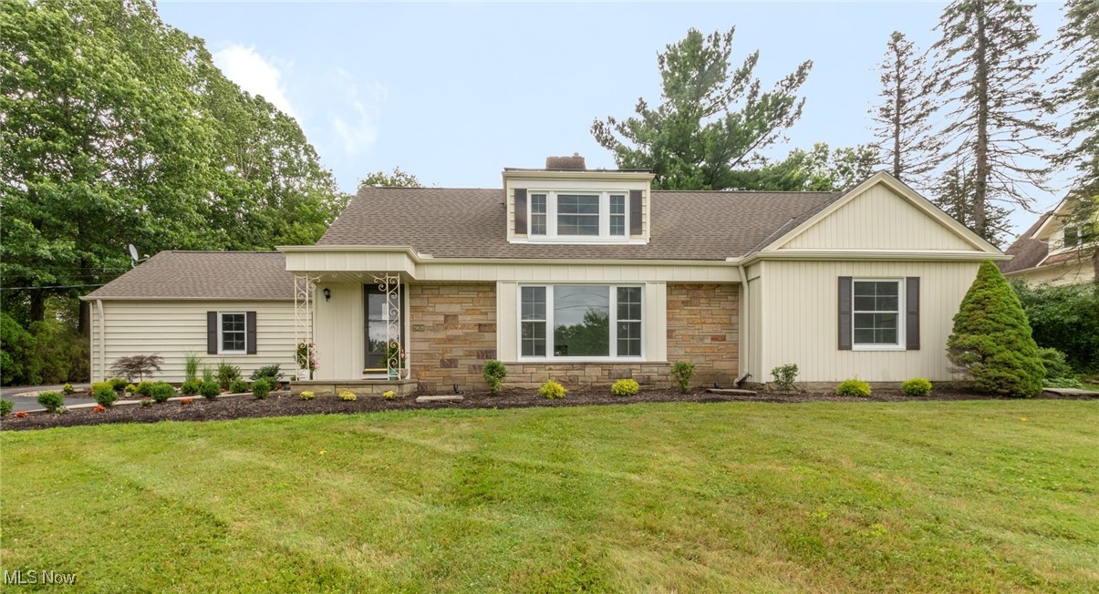 Incredible Curb Appeal on the outside, with a Completely Renovated interior in this beautiful Cape Cod home! Set on a one acre lot with all new landscaping, this home offers New Spring of 2025 Appliances, Windows, Flooring, Paint, Kitchen and Baths! Living Room with picture window to the front garden has fireplace and Wide Plank Luxury Vinyl Tile floors. Dining room off Living Room has coved moldings and New 2025 Light fixture for great entertaining space. Fantastic and totally redone down to the studs, the Kitchen offers Luxury Vinyl Tile floors, Quartz counters, Subway Tile backsplash, Quality Cabinetry with hardware and fixtures, and Stainless Steel Appliances - perfect inspiration for the Home Chef! Ample Laundry off Kitchen with access to the two car Garage. First floor Master with New 2025 carpet and New 2025 Full Bath with stall shower. Two more Bedrooms on first share a New 2025 Full Bath in hall with shower over tub! Upstairs you will find two Large Bedrooms and New 2025 Full Bath on either side of a sizable Loft space with built-in shelves, perfect for Home Office or Media/Play room. Outdoor Patio in a private backyard surrounded by trees and landscaped grounds for outdoor enjoyment! New Roof by dormer. Furnace 8 years old. New Walking Path in Median! Award winning Orange Schools. Don't Miss!!